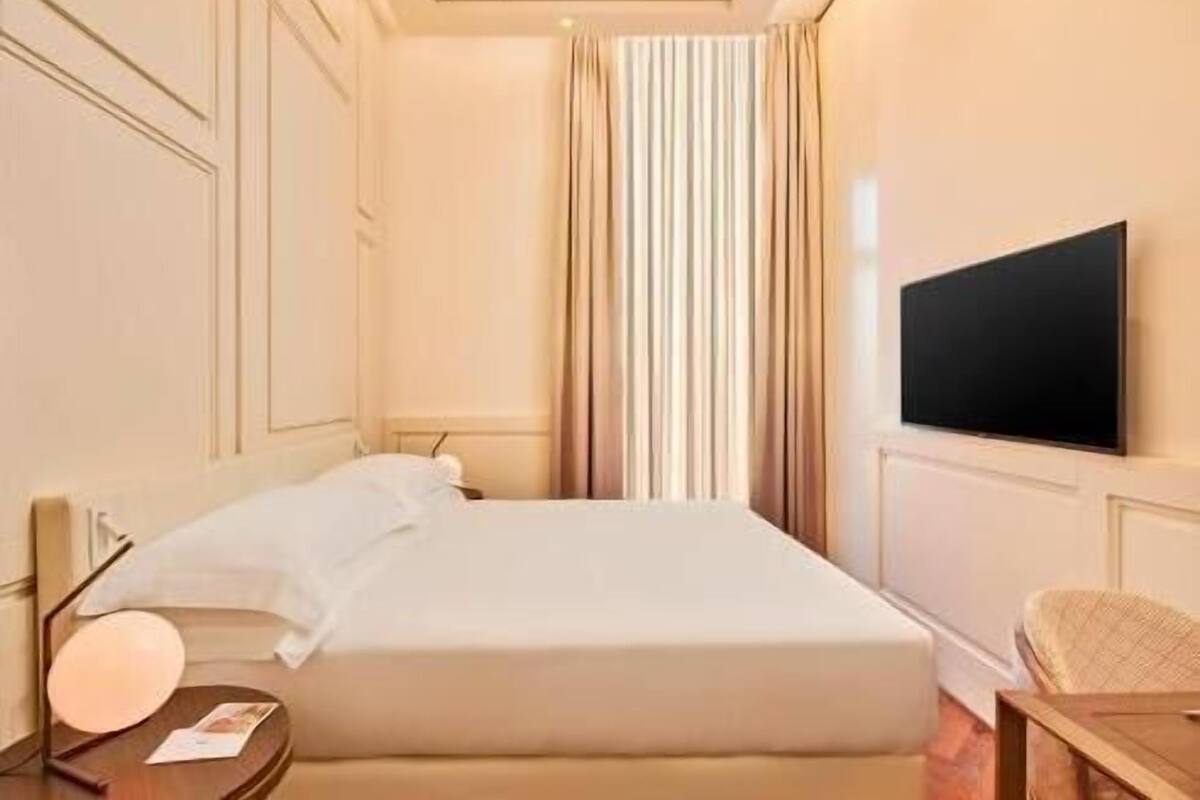 Premium bedding, down duvets, memory-foam beds, minibar