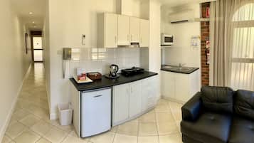 Suite 42 | Private kitchenette | Fridge, microwave, coffee/tea maker, electric kettle