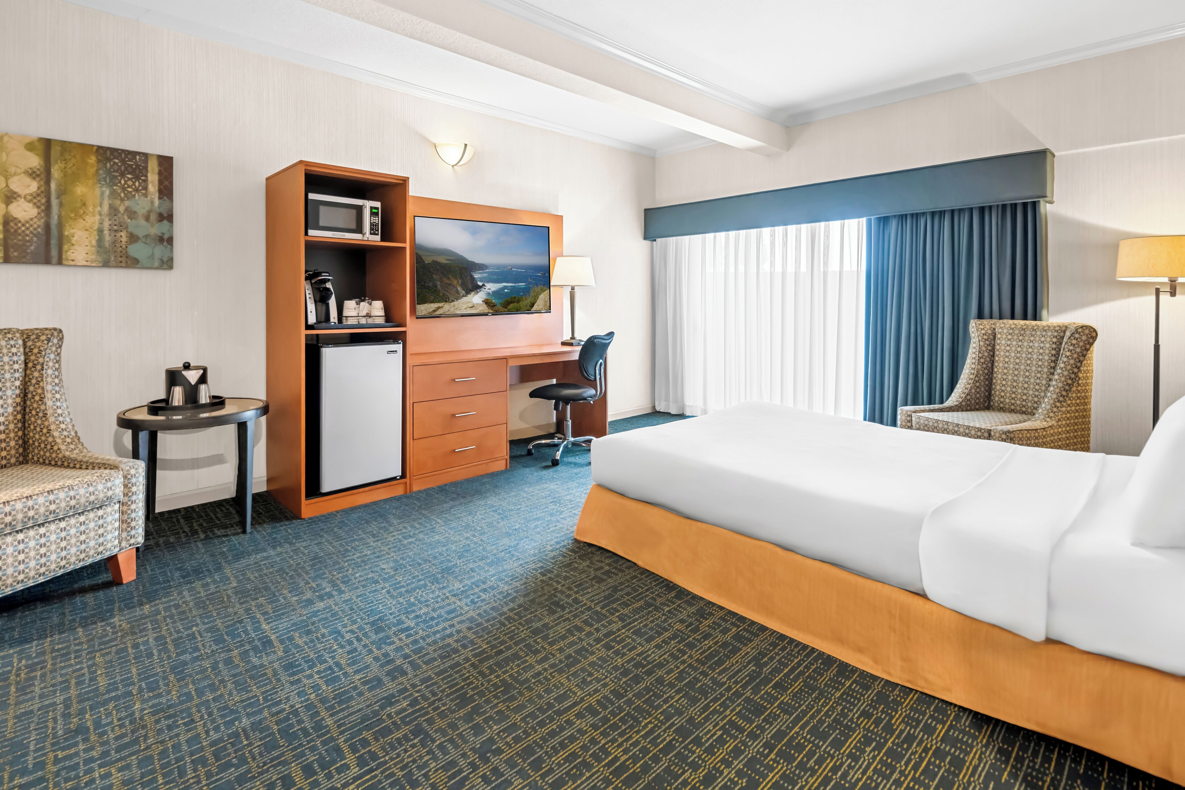 suite, 1 king bed, non smoking (living room) | living area | 55-inch flat-screen tv with cable channels, tv