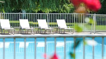 Outdoor pool, open 9:00 AM to 9:00 PM, sun loungers