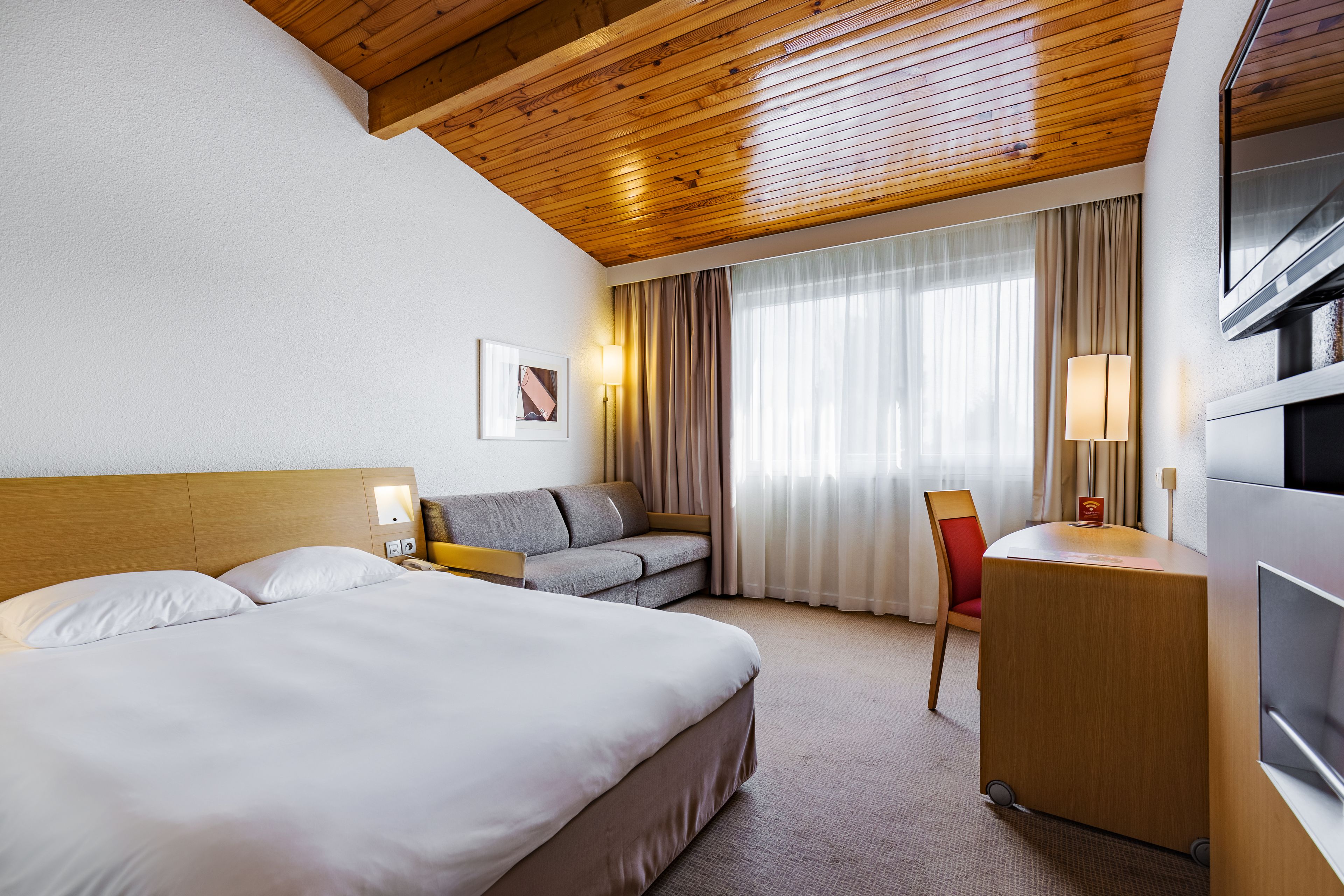 premium bedding, memory-foam beds, in-room safe, desk