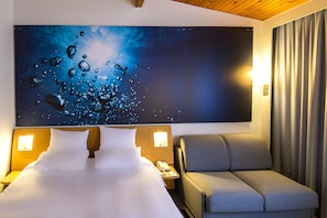 Premium bedding, memory-foam beds, in-room safe, desk