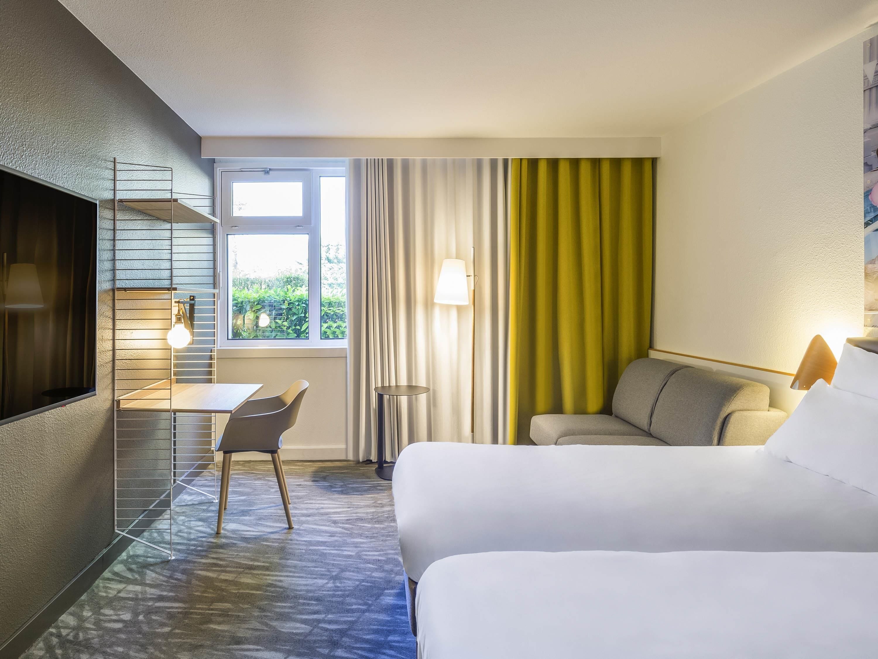 premium bedding, memory-foam beds, in-room safe, desk