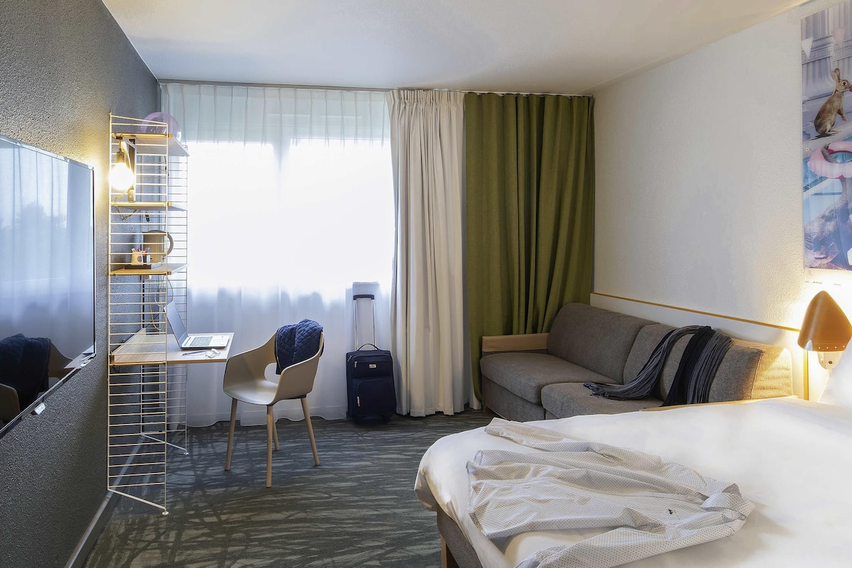 Premium bedding, memory-foam beds, in-room safe, desk