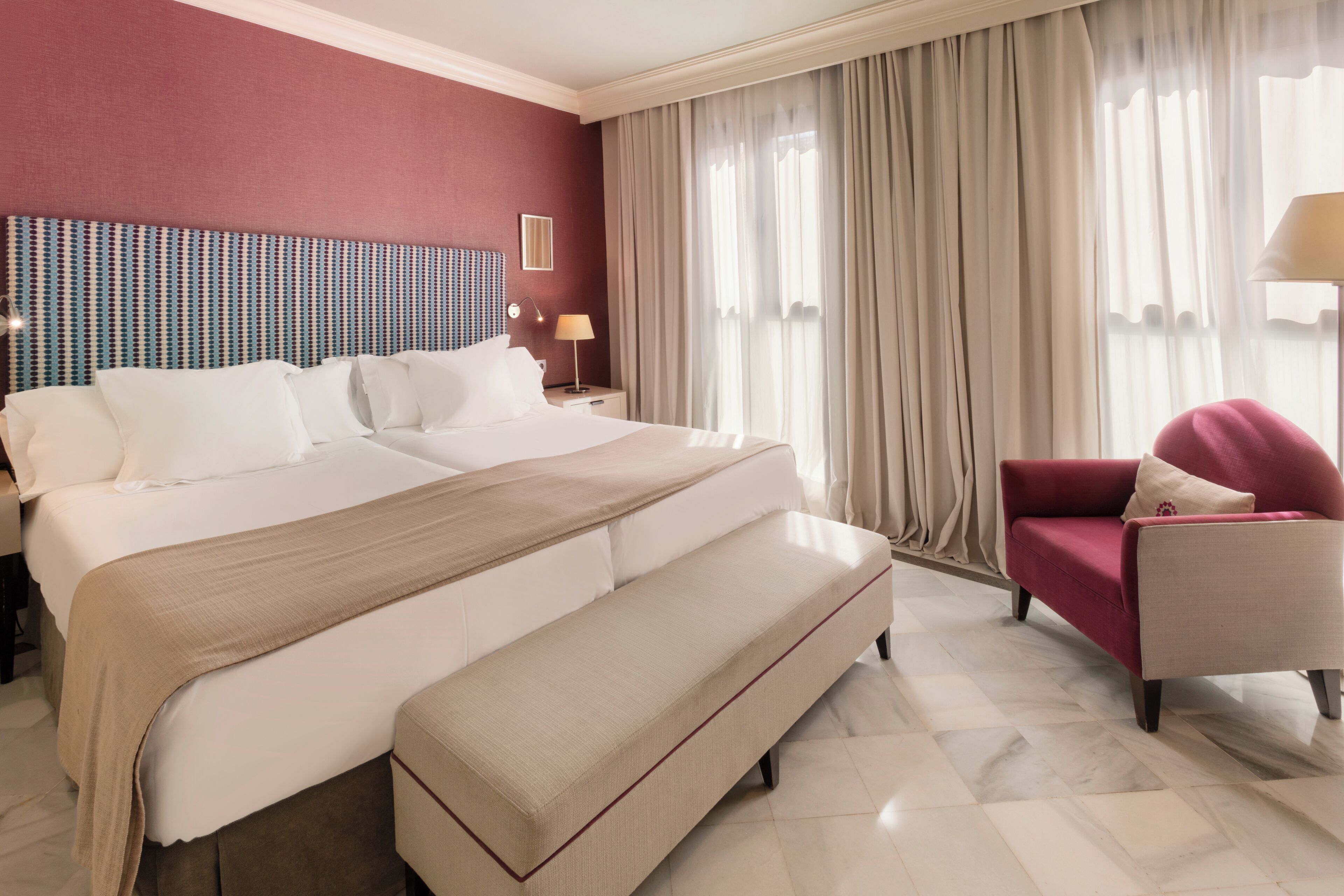Premium bedding, down comforters, minibar, in-room safe