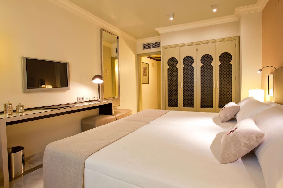 1 kamar tidur, seprai premium, selimut bulu angsa, dan minibar
