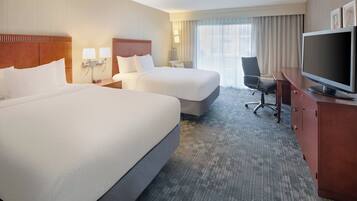 Hypo-allergenic bedding, pillowtop beds, desk, laptop workspace