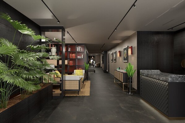 A modern reception area with a reception desk, seating area, and a bookshelf. - Universo And Nord Hotel (Venice)