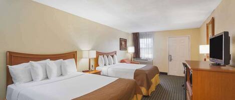 Desk, blackout drapes, iron/ironing board, free cribs/infant beds