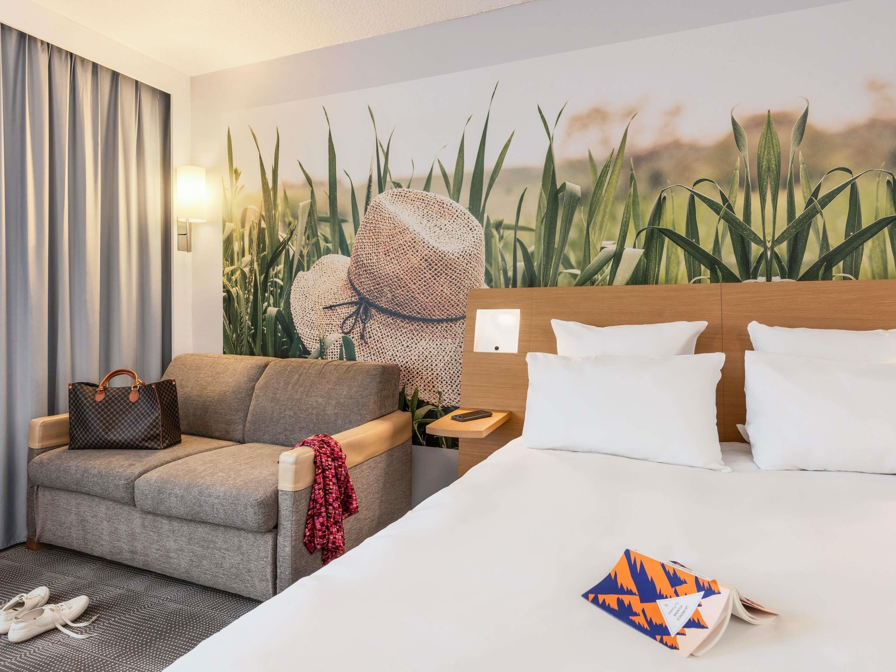 Superior kamer, 1 tweepersoonsbed met slaapbank | Een kluis op de kamer, individueel gedecoreerd, individueel gemeubileerd