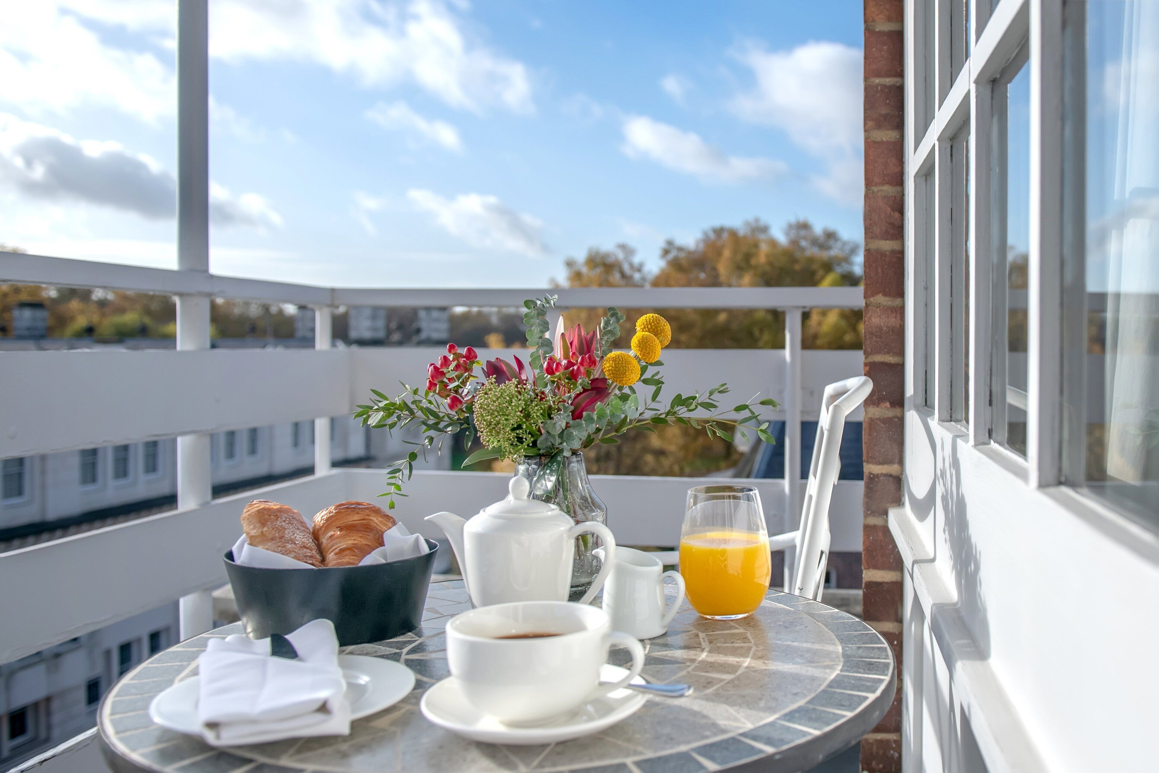 luxury suite, 1 bedroom, balcony, city view | premium bedding, in-room safe, individually furnished, desk