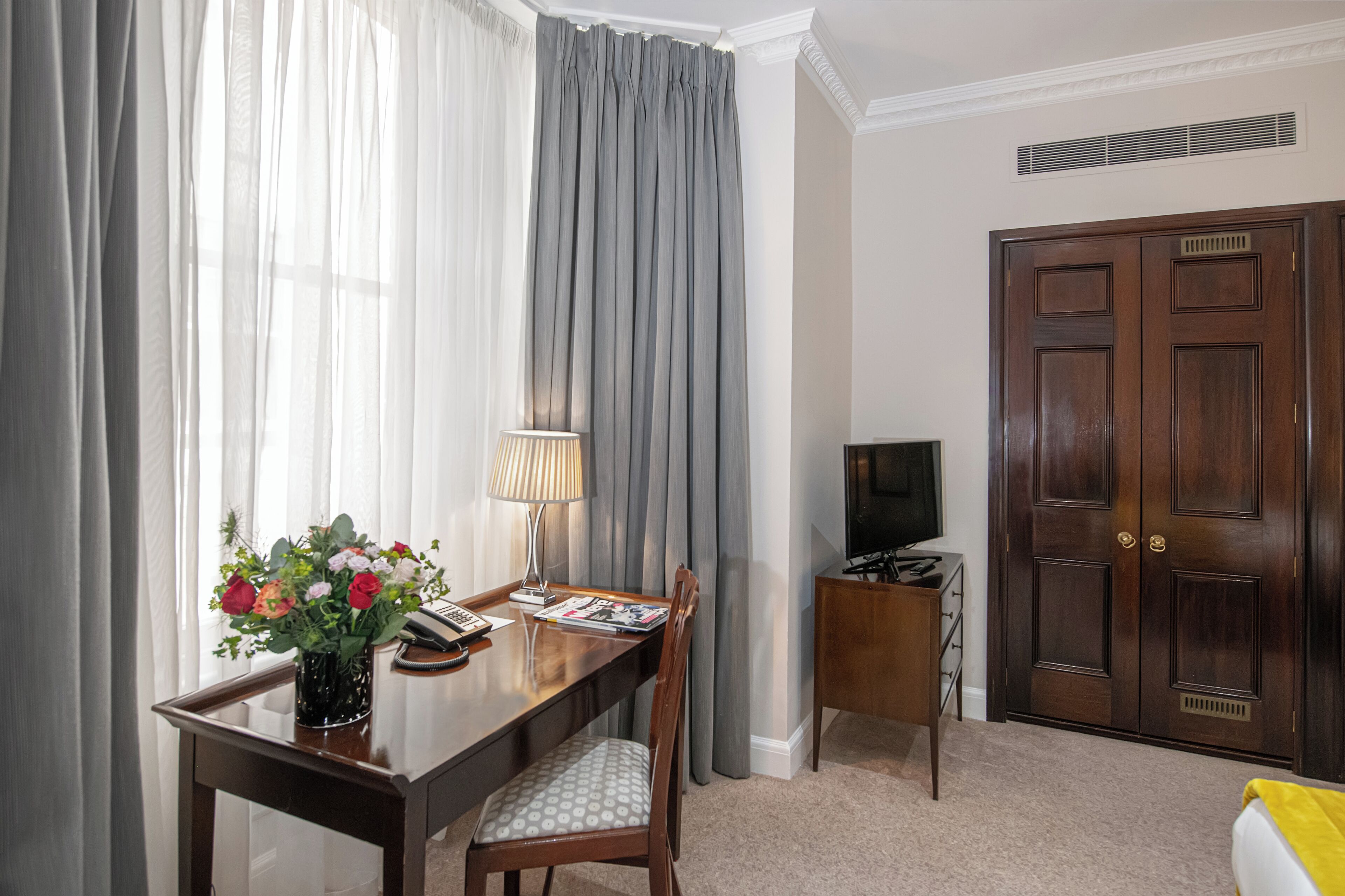 deluxe double room, 1 king bed | premium bedding, in-room safe, individually furnished, desk