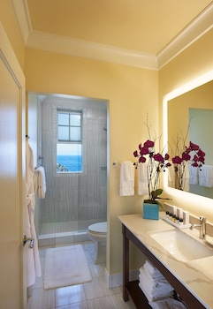 Designer toiletries, hair dryer, bathrobes, slippers at Grande Colonial Hotel