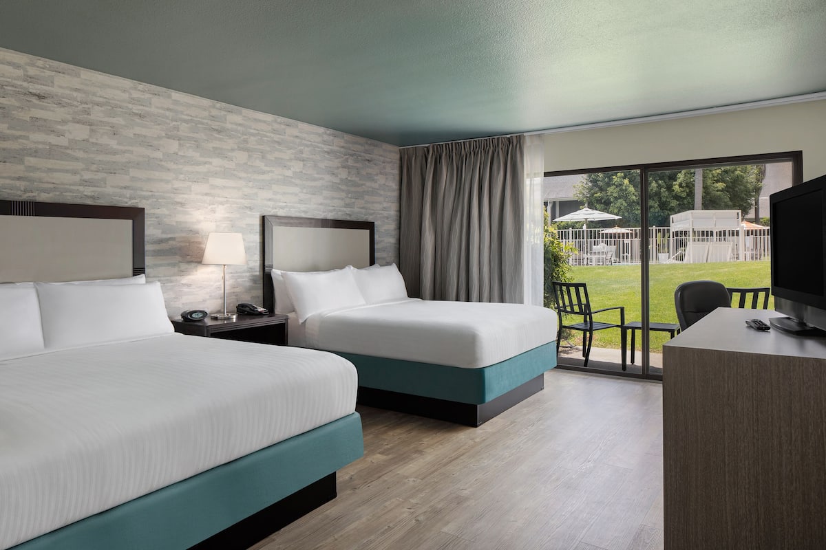 Deluxe Room, 2 Queen Beds, Terrace, Pool View | 1 bedroom, hypo-allergenic bedding, in-room safe, desk