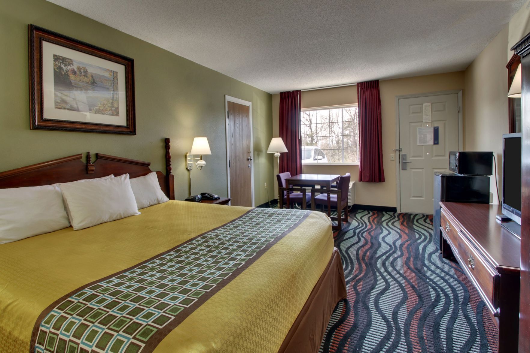 Premium bedding, pillowtop beds, desk, laptop workspace