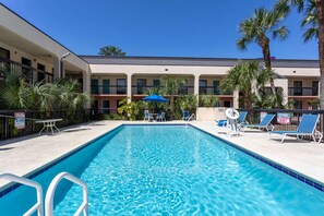 Outdoor pool, open 8 AM to 10 PM, pool umbrellas