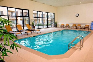 Indoor pool, open 6:00 AM to 10:00 PM, pool loungers