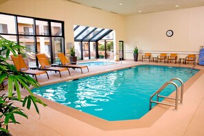 Indoor pool, open 6:00 AM to 10:00 PM, pool loungers
