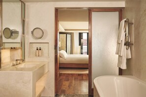 Contemporary Studio | Bathroom | Combined shower/tub, designer toiletries, hair dryer, bathrobes