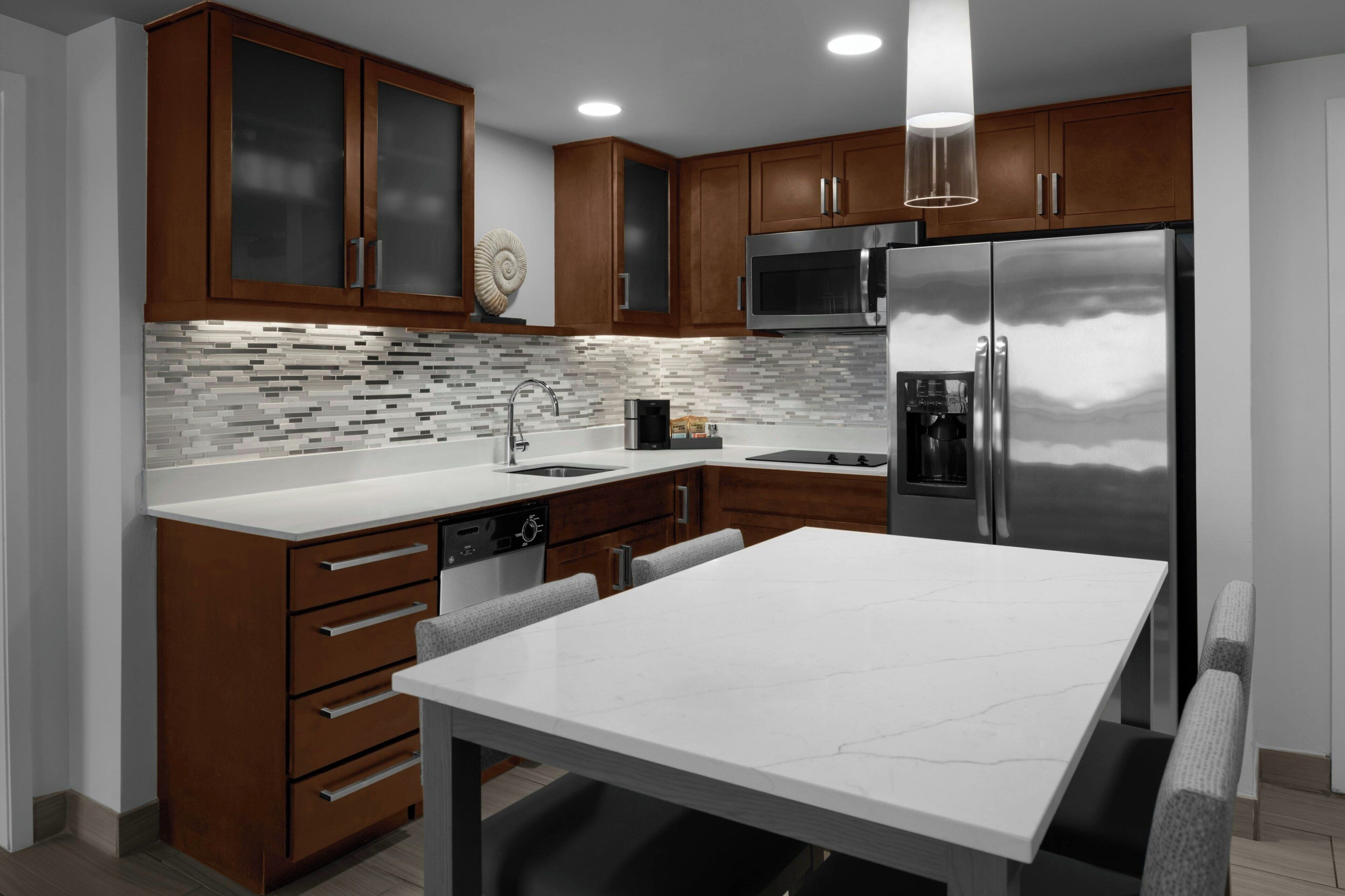 suite, 1 bedroom | private kitchen | full-sized fridge, microwave, stovetop, dishwasher