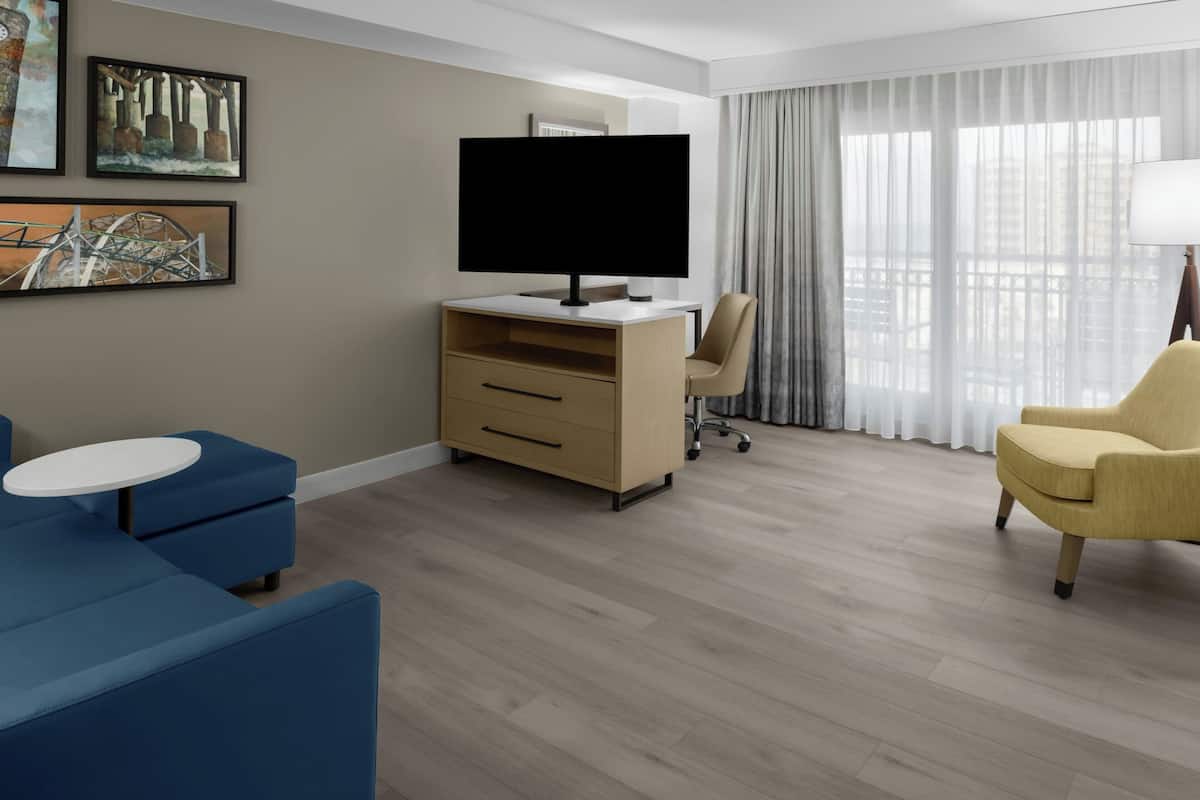 Suite, 1 chambre, non-fumeur, vue partielle sur l'océan | Salle de séjour