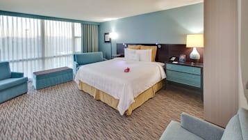 Premium kamer, 1 kingsize bed | Luxe beddengoed, een kluis op de kamer, een bureau, een laptopwerkplek