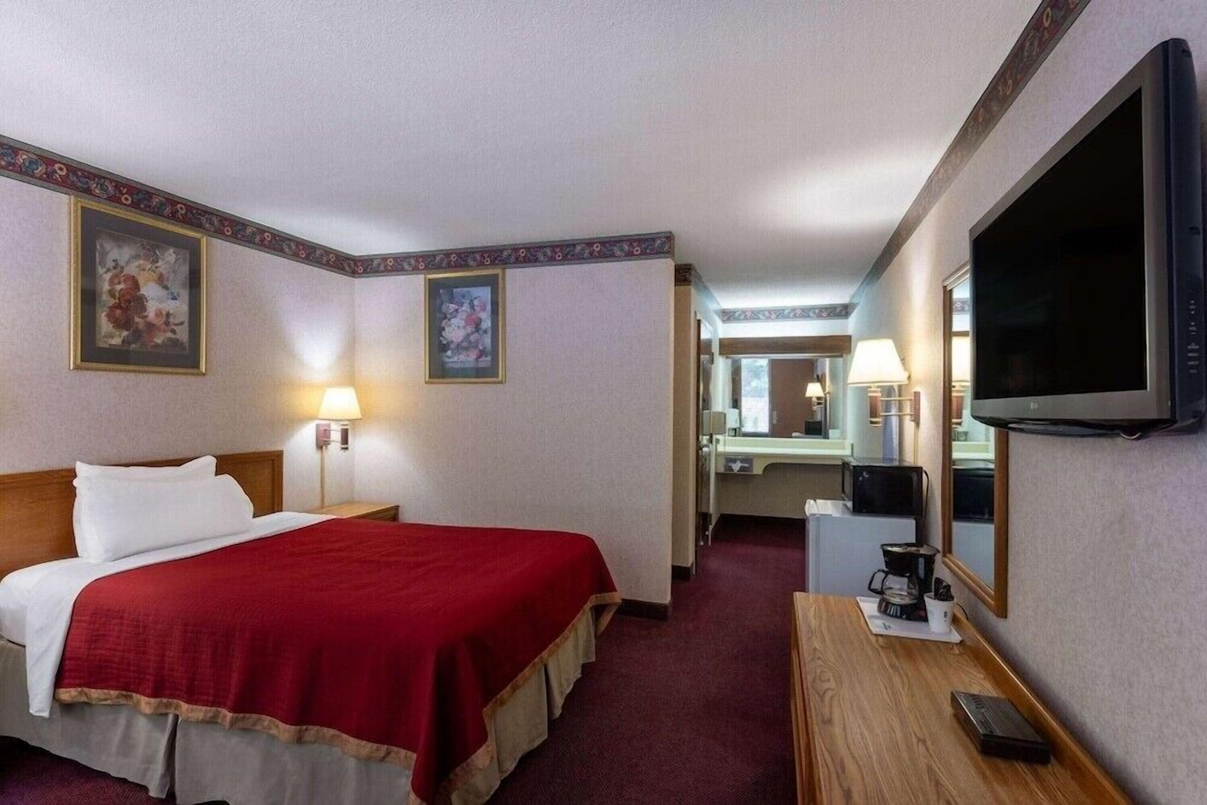 In-room safe, desk, blackout drapes, iron/ironing board