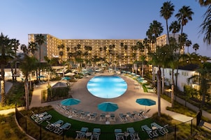 2 outdoor pools, a heated pool, pool cabanas (surcharge), pool loungers