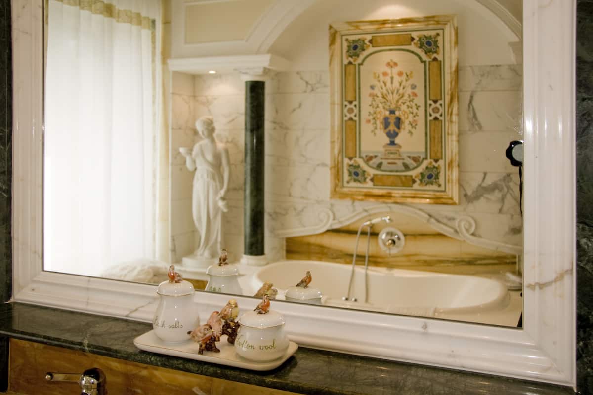 imperial suite | bathroom | combined shower/bathtub, jetted bath, designer toiletries, hair dryer