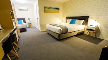 Suite Standard Single Room, Non Smoking | Desk, laptop workspace, blackout drapes, iron/ironing board