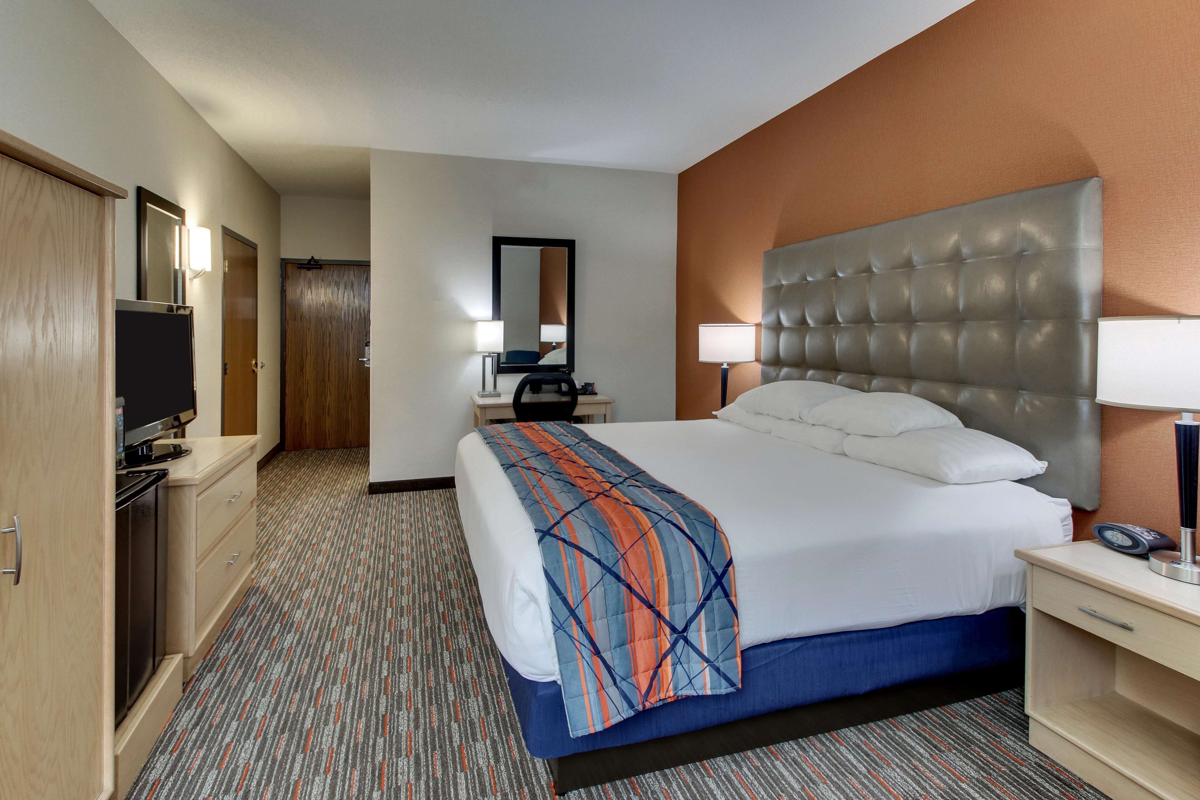 desk, laptop workspace, blackout curtains, free cots/infant beds