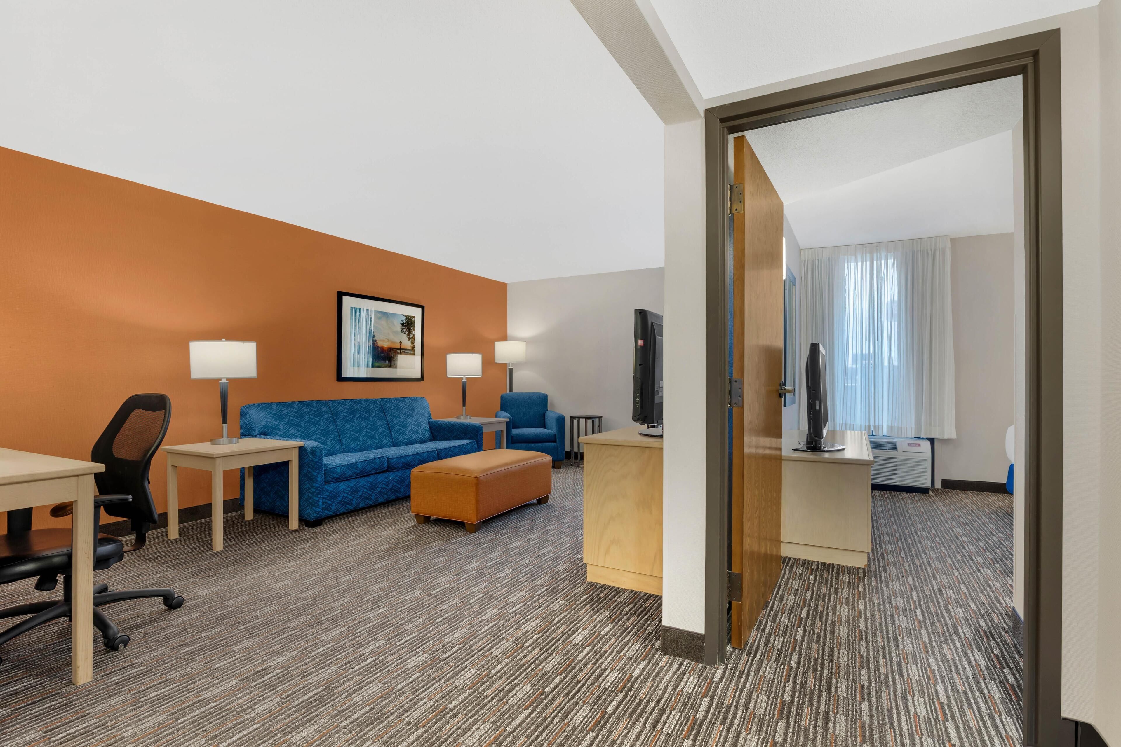 Desk, laptop workspace, blackout curtains, free cots/infant beds