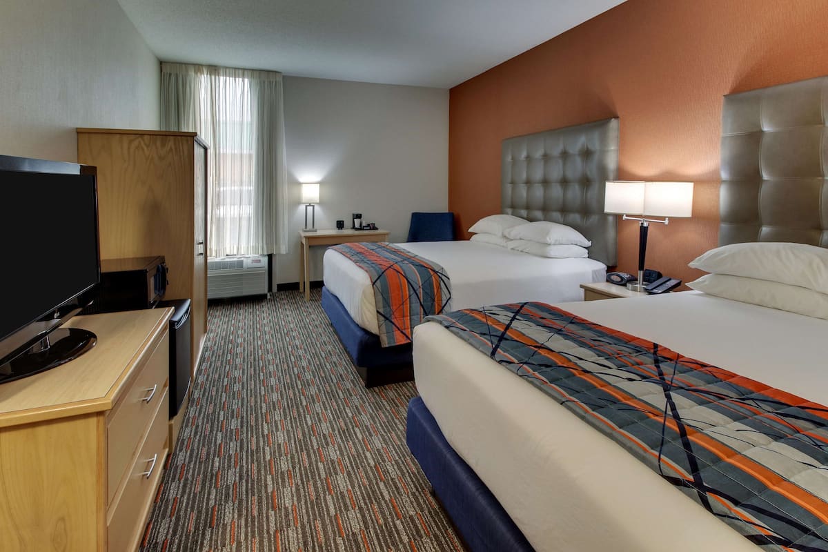 desk, laptop workspace, blackout curtains, free cots/infant beds