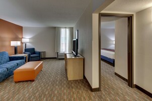 Desk, laptop workspace, blackout drapes, free cribs/infant beds