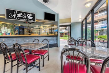 Breakfast area at Clarion Inn Orlando International Drive - ICON Park  