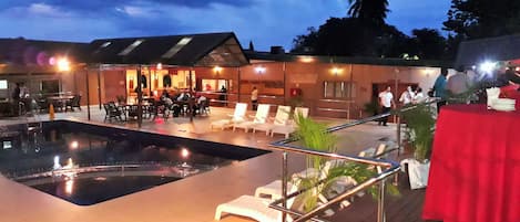 Outdoor pool, pool umbrellas, pool loungers