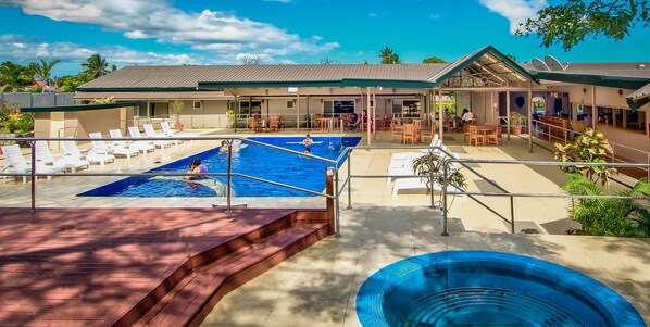 Outdoor pool, pool umbrellas, sun loungers