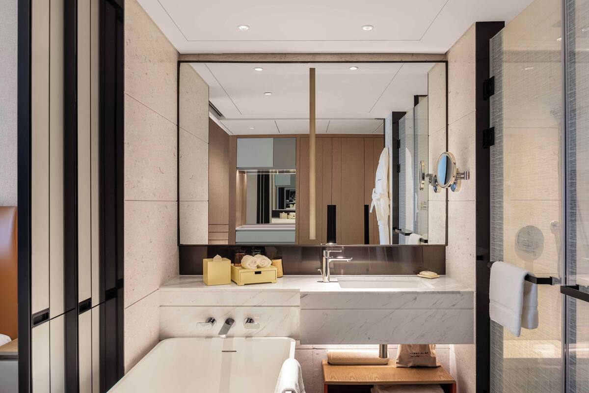 Luxe beddengoed, donsdekens, Select Comfort-bedden, een minibar