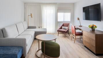 Suite (Domain) | Living area | 42-inch LCD TV with cable channels, TV