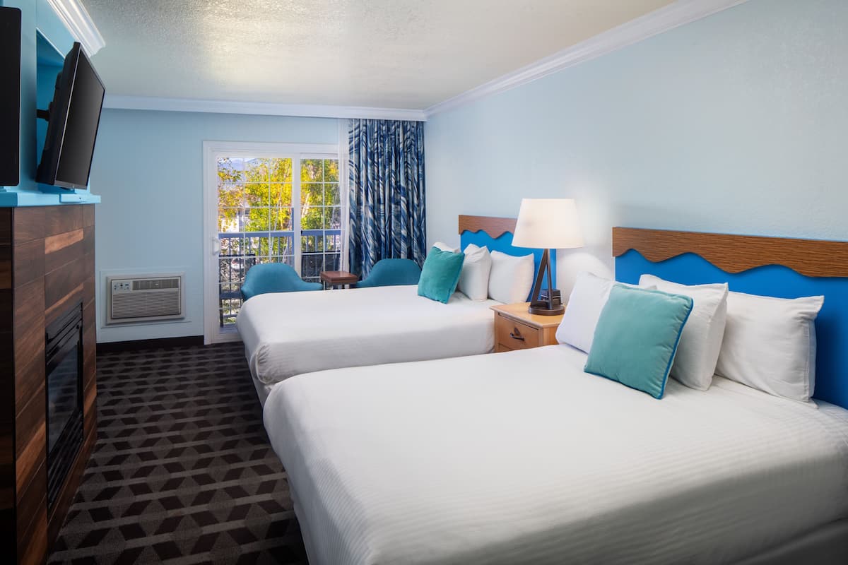 Premium bedding, down comforters, blackout drapes, iron/ironing board