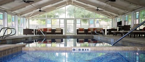 Indoor pool, open 6 AM to 10 PM, pool loungers