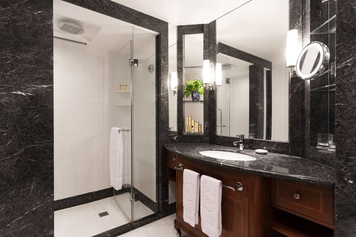 hair dryer, bathrobes, slippers, towels