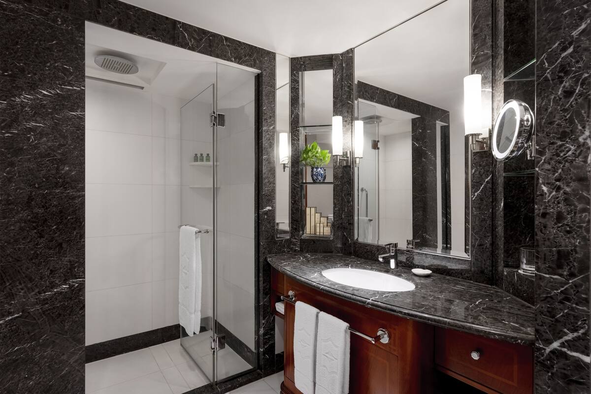 hair dryer, bathrobes, slippers, towels