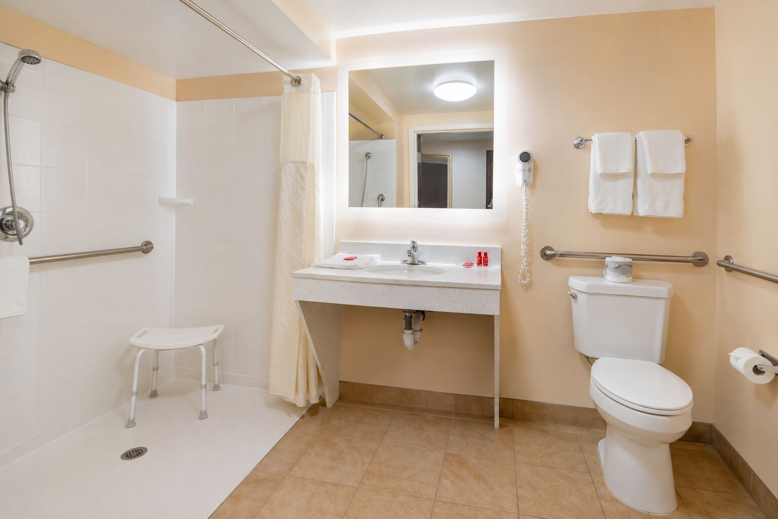 Shower, free toiletries, hair dryer, towels