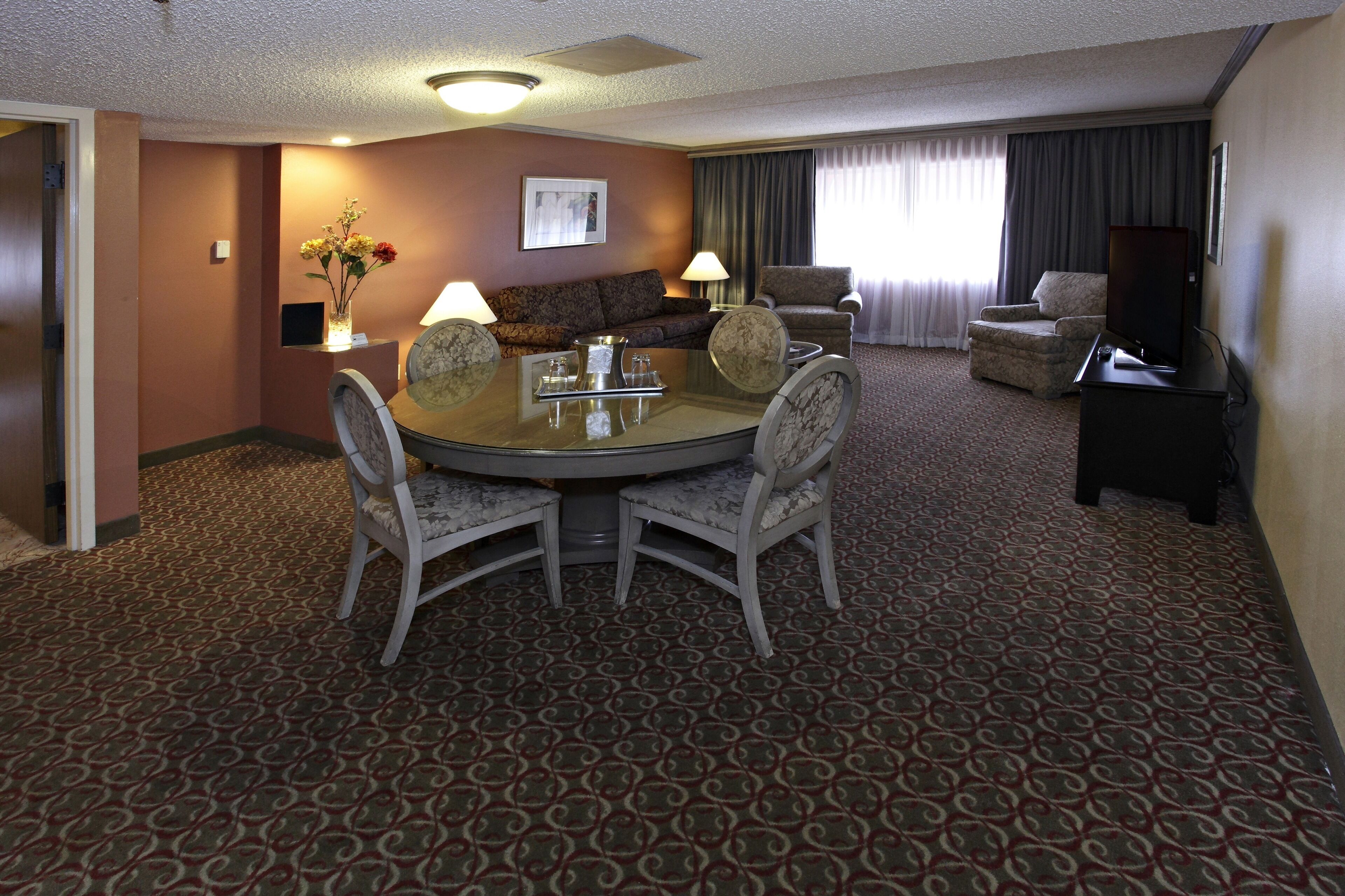 Presidential Suite, 1 Bedroom, Non Smoking | Living area | 39-inch TV with cable channels