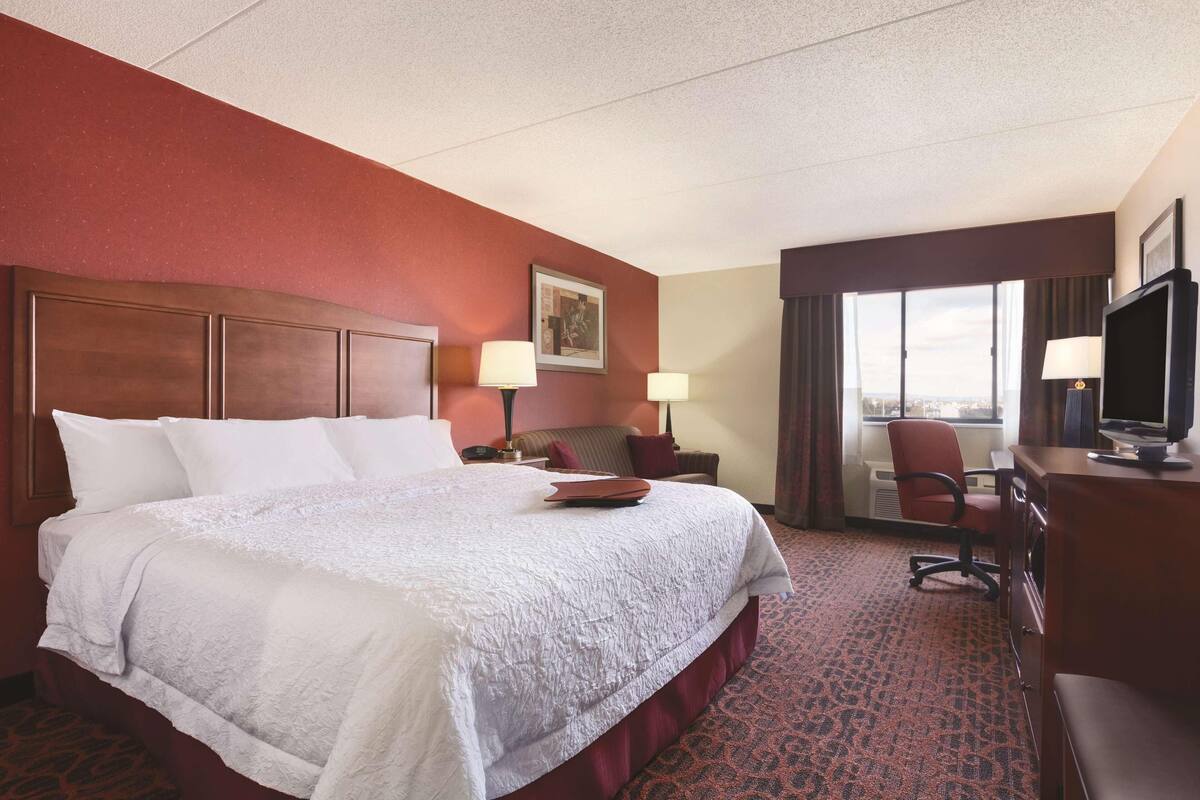 Blackout drapes, iron/ironing board, cribs (free), WiFi (free)
