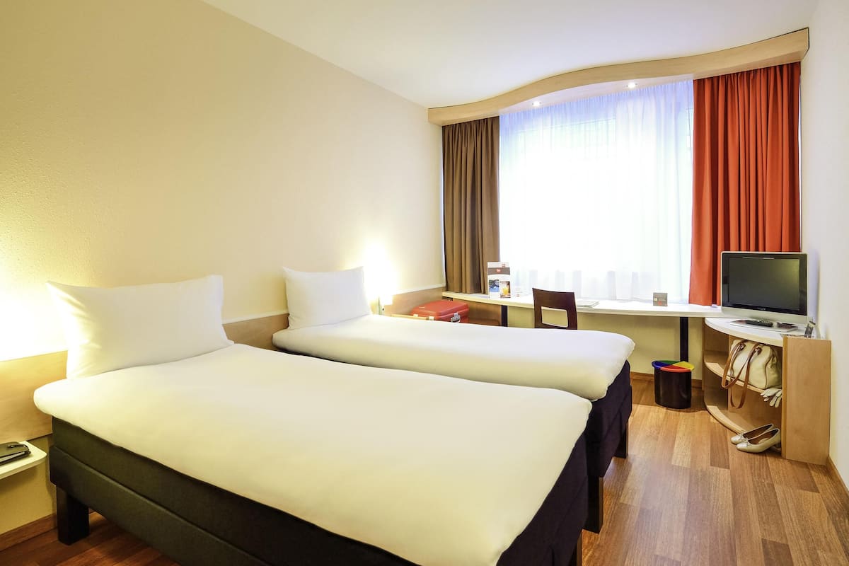 Room, 2 Single Beds | In-room safe, desk, laptop workspace, blackout curtains