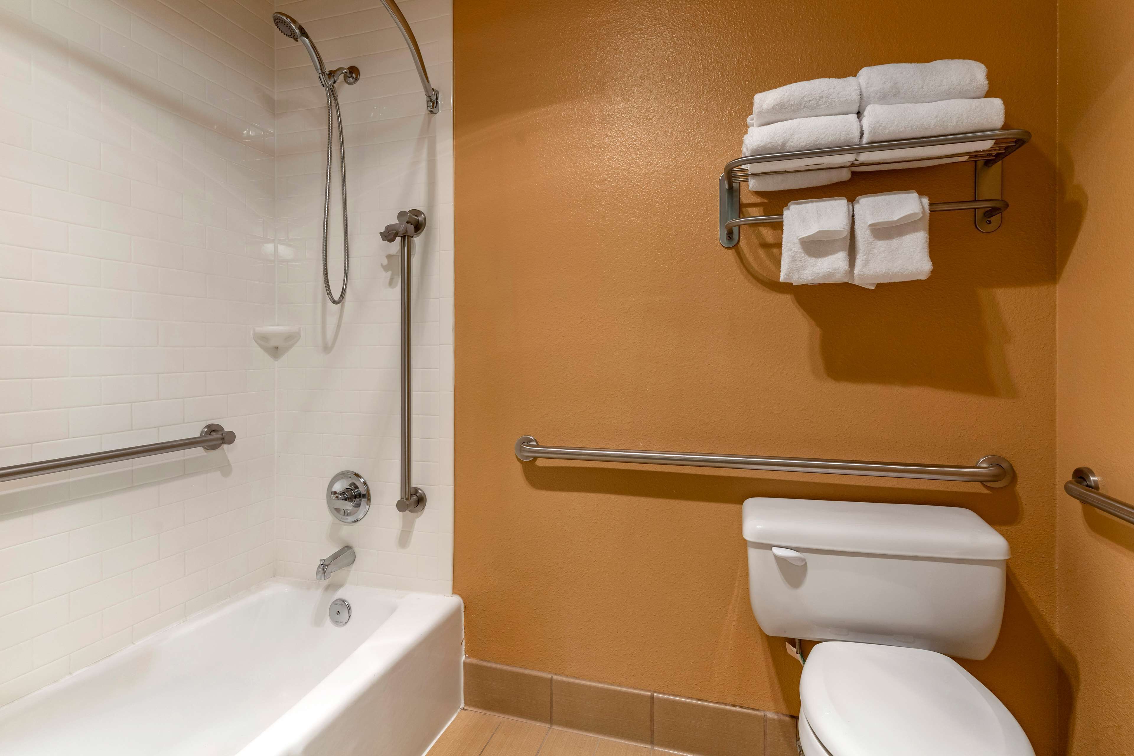combined shower/bathtub, free toiletries, hair dryer, towels