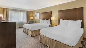 A hotel room with two beds, a desk, and a chair. - Best Western Plus Garden Court Inn (Fremont)