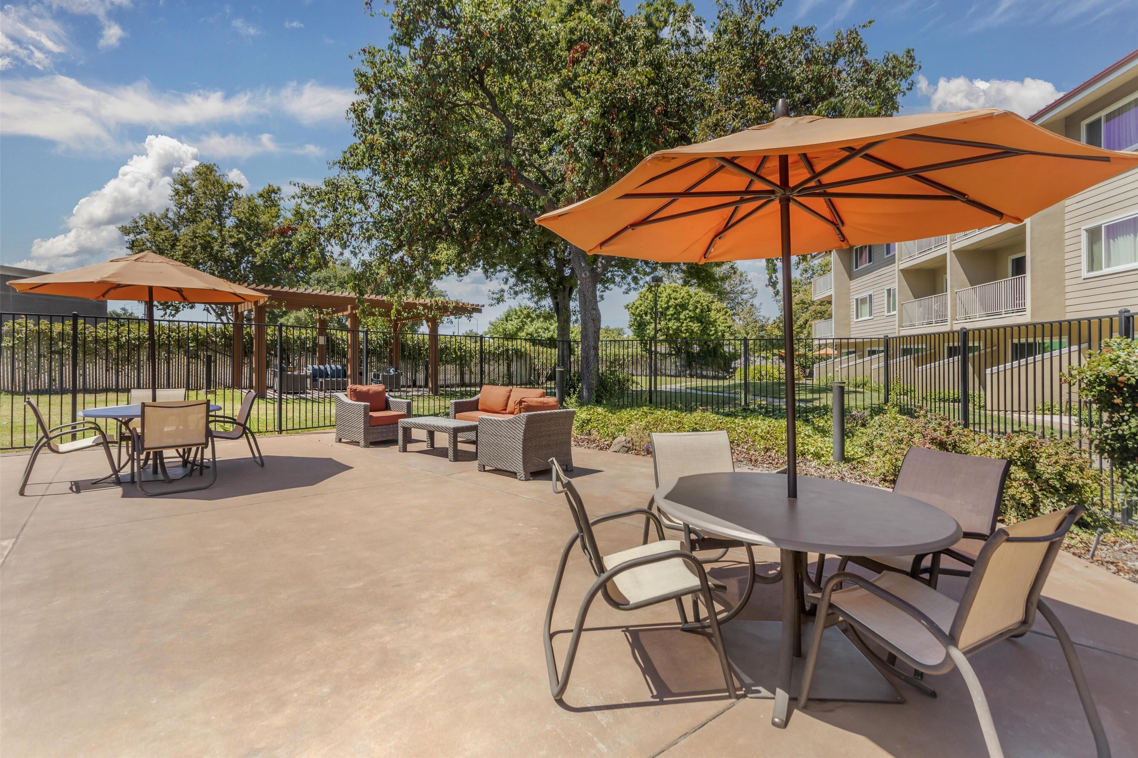 Outdoor pool, open 8 AM to 10 PM, pool loungers